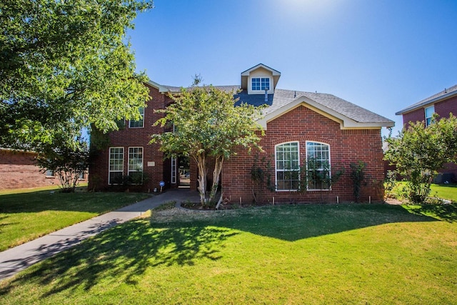 view of front facade with a front yard