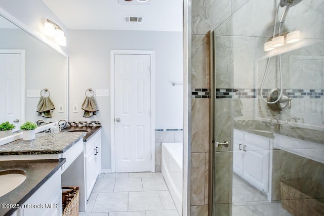 1308 Nottingham Ave, Wolfforth, TX 79382 - bathroom with vanity, a stall shower, and a bath