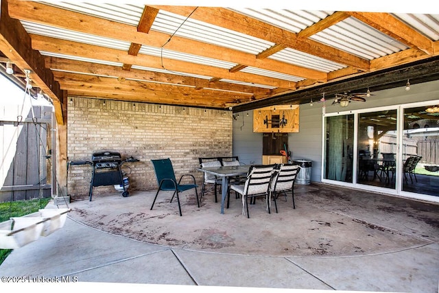 1308 Nottingham Ave, Wolfforth, TX 79382 - view of patio / terrace with ceiling fan, outdoor dining area, and area for grilling