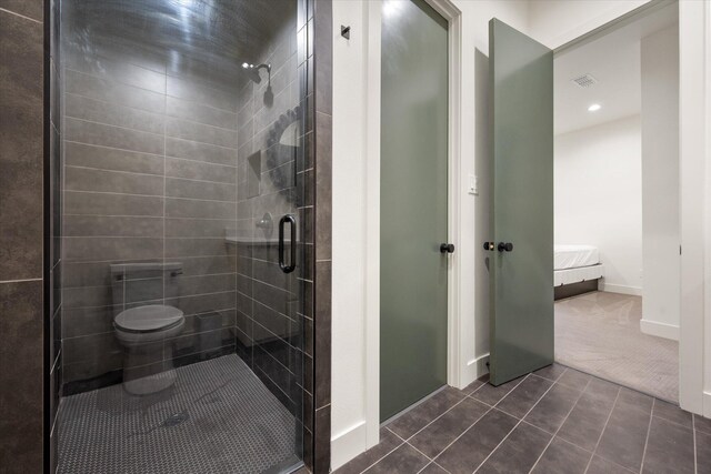 12001 Vicksburg Ave, Lubbock, TX 79424 - ensuite bathroom with a shower stall, tile patterned flooring, baseboards, toilet, and recessed lighting