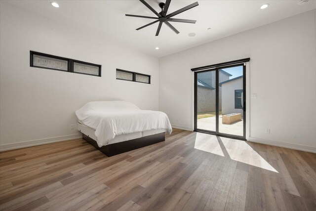 12001 Vicksburg Ave, Lubbock, TX 79424 - bedroom with access to exterior, wood finished floors, recessed lighting, and baseboards