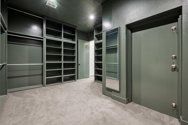 12001 Vicksburg Ave, Lubbock, TX 79424 - walk in closet featuring carpet floors