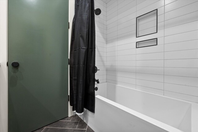 12001 Vicksburg Ave, Lubbock, TX 79424 - bathroom featuring shower / bath combination with curtain and tile patterned floors