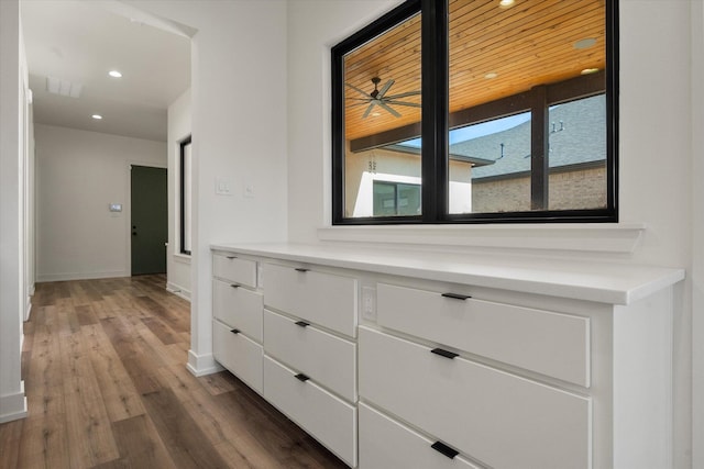12001 Vicksburg Ave, Lubbock, TX 79424 - corridor with recessed lighting, dark wood-type flooring, and baseboards