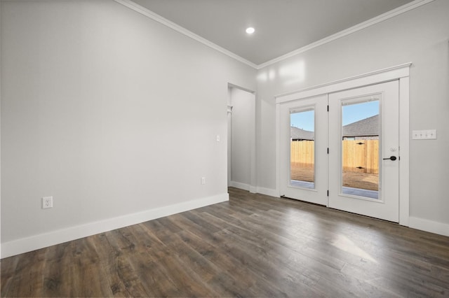 unfurnished room with crown molding and dark wood-type flooring