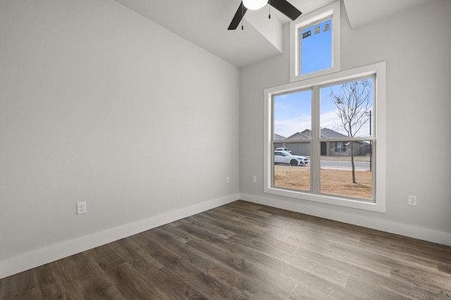 spare room with ceiling fan and hardwood / wood-style floors