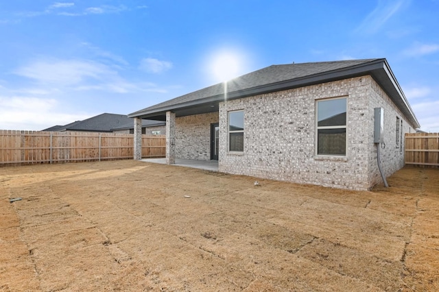 back of house featuring a patio