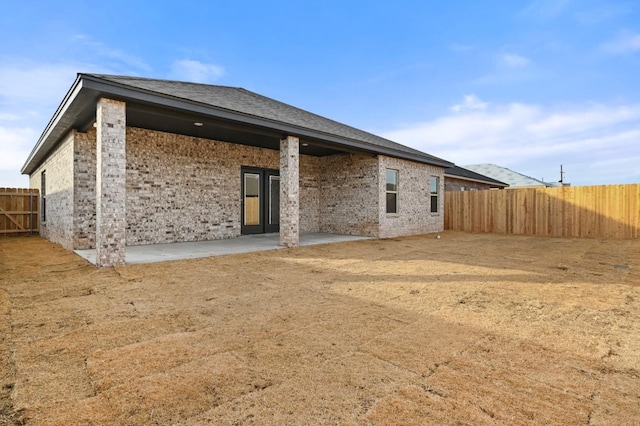 rear view of house featuring a patio area