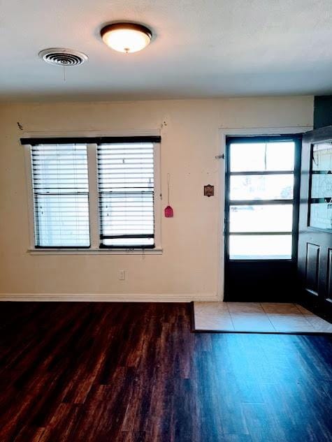 entrance foyer with hardwood / wood-style floors