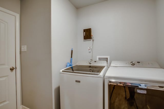 laundry area with washer and dryer