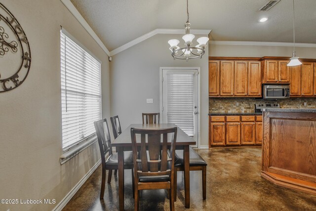5902 Valencia Ave, Lubbock, TX 79407 - kitchen with appliances with stainless steel finishes, brown cabinets, dark countertops, decorative backsplash, and vaulted ceiling