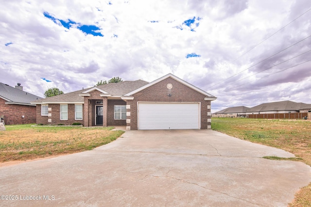 5902 Valencia Ave, Lubbock, TX 79407 - single story home featuring brick siding, an attached garage, concrete driveway, and roof with shingles