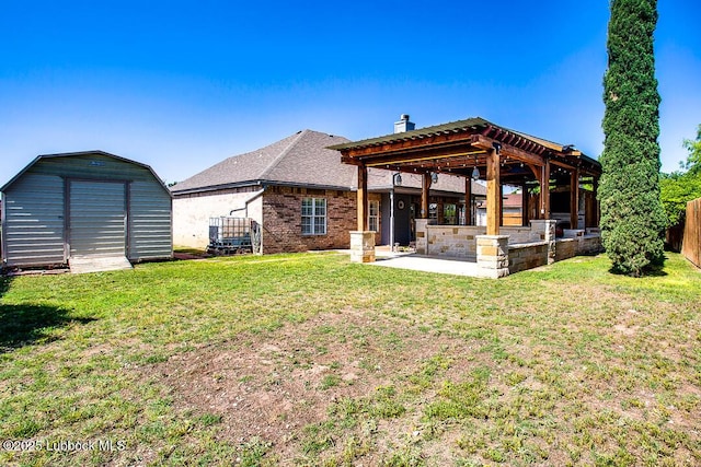 8 W Canyonview Dr, Ransom Canyon, TX 79366 - back of house featuring a patio, a chimney, and brick siding