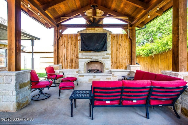 8 W Canyonview Dr, Ransom Canyon, TX 79366 - view of patio featuring an outdoor living space with a fireplace and a gazebo