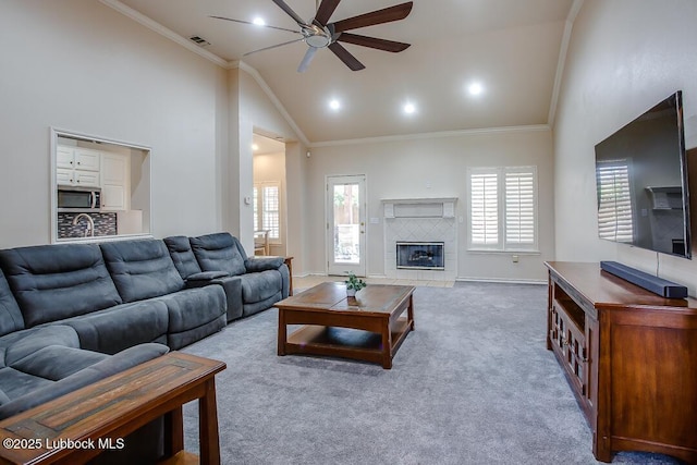8 W Canyonview Dr, Ransom Canyon, TX 79366 - carpeted living room featuring a ceiling fan, ornamental molding, high vaulted ceiling, a fireplace, and baseboards