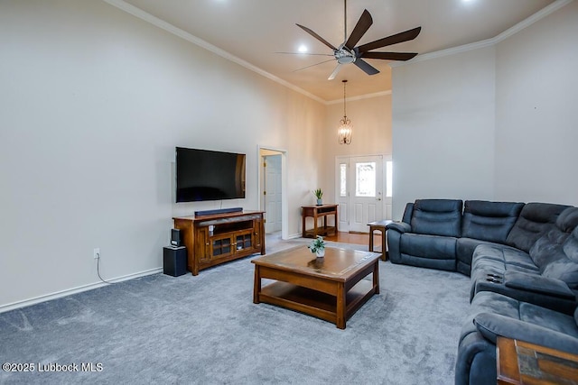 8 W Canyonview Dr, Ransom Canyon, TX 79366 - living area with a ceiling fan, a high ceiling, carpet floors, crown molding, and baseboards
