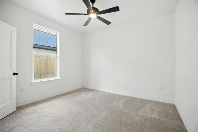 1406 Durham Ave, Wolfforth, TX 79382 - carpeted spare room with ceiling fan and baseboards