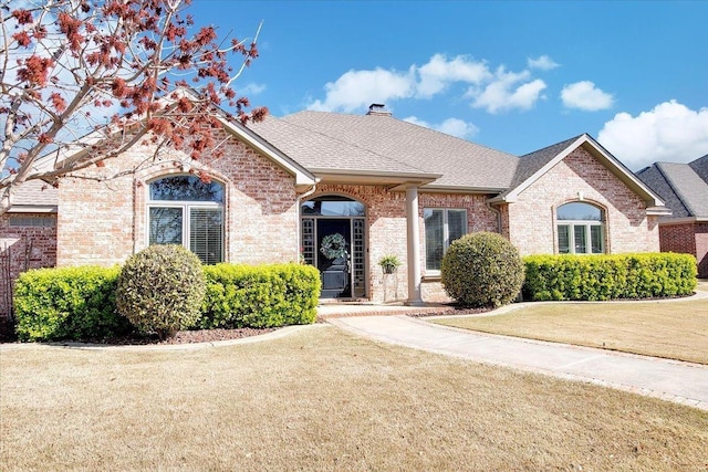 view of front of home with a front yard