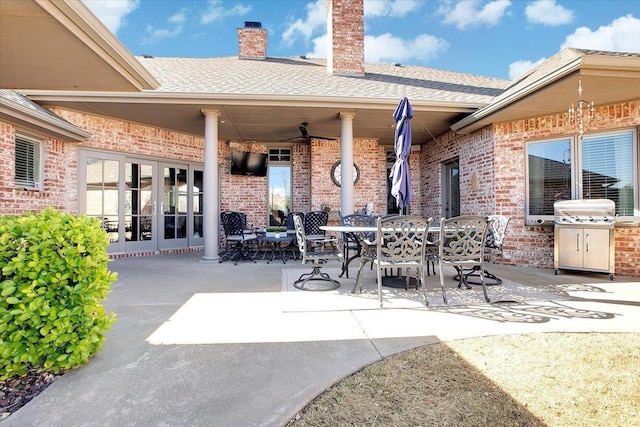 view of patio featuring a grill, ceiling fan, and french doors