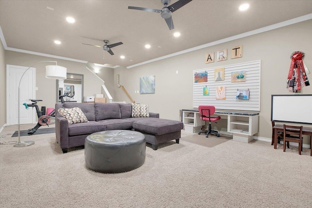 living room with ceiling fan, ornamental molding, and light carpet