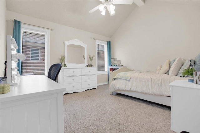 carpeted bedroom with multiple windows, high vaulted ceiling, and ceiling fan