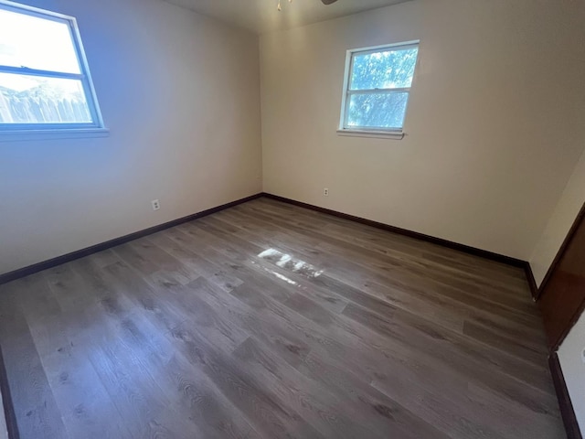 empty room featuring hardwood / wood-style flooring