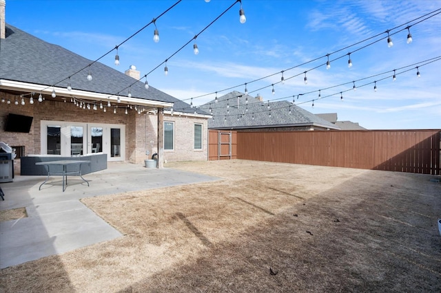 back of property featuring a patio