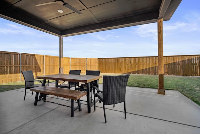 view of patio featuring ceiling fan