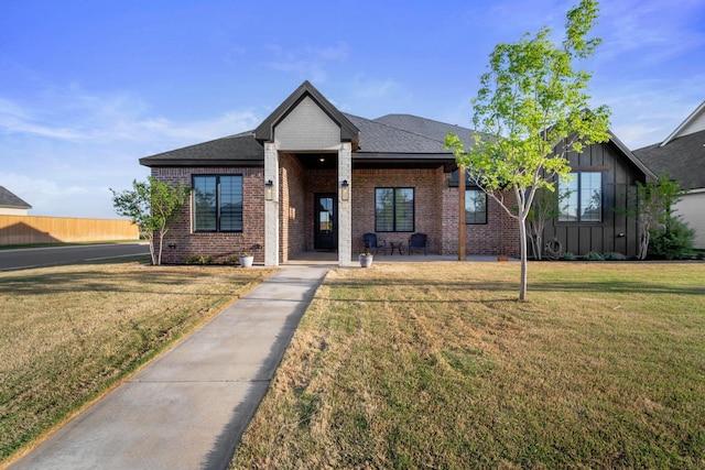 view of front of property with a front lawn