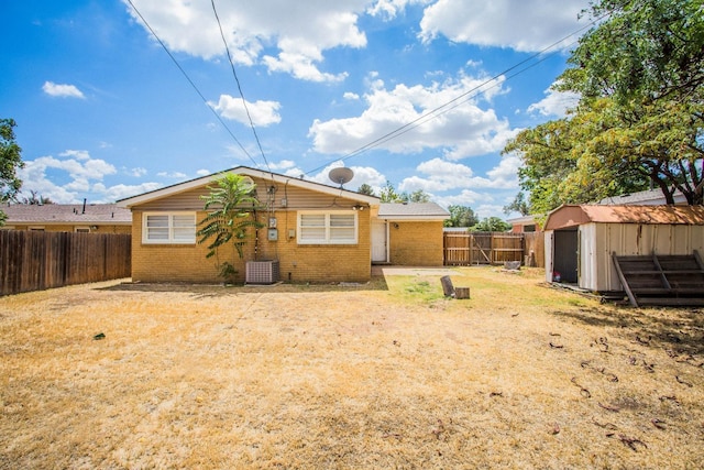 back of property with cooling unit and a storage unit