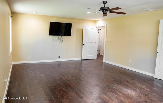 5412 20th St, Lubbock, TX 79407 - unfurnished living room with ceiling fan, dark wood-type flooring, baseboards, and recessed lighting