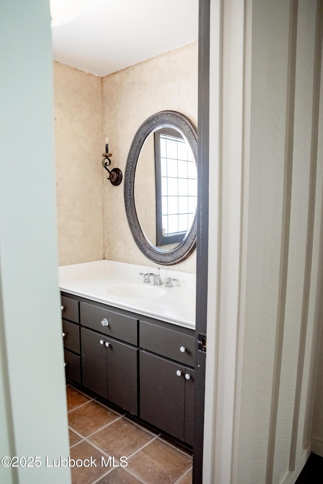 5412 20th St, Lubbock, TX 79407 - bathroom with vanity and tile patterned flooring