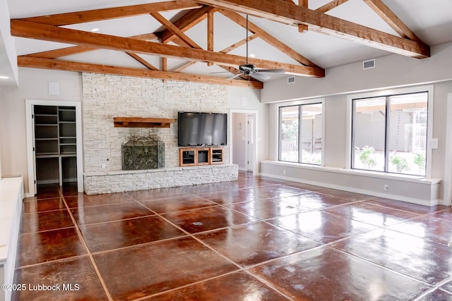 5412 20th St, Lubbock, TX 79407 - unfurnished living room featuring ceiling fan, a stone fireplace, beam ceiling, baseboards, and high vaulted ceiling