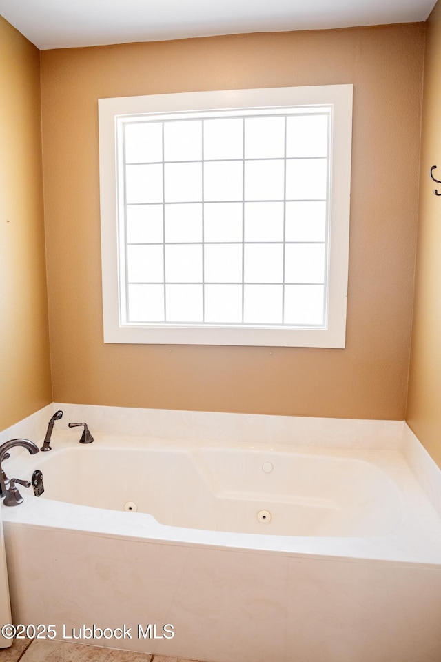 5412 20th St, Lubbock, TX 79407 - bathroom featuring a tub with jets