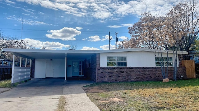 single story home with a carport