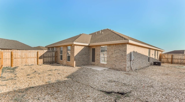 back of property featuring a patio and central air condition unit