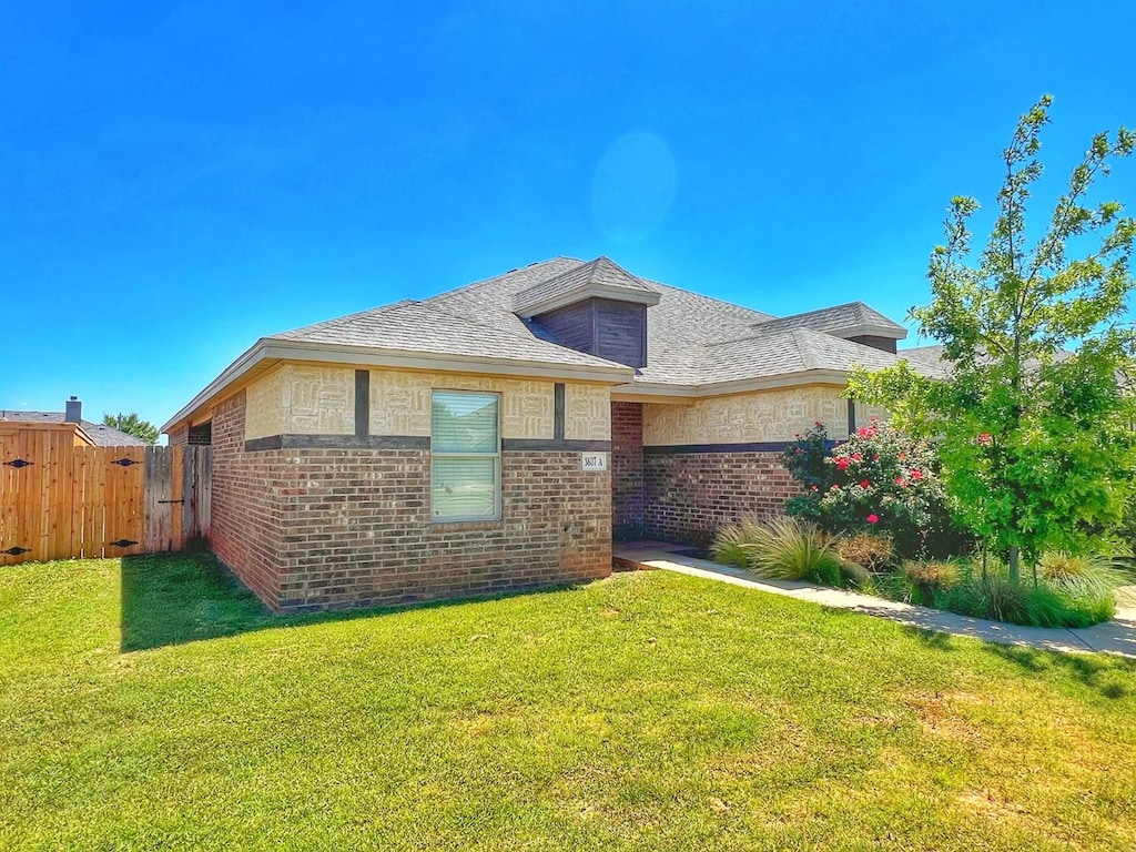 view of front of home with a front yard