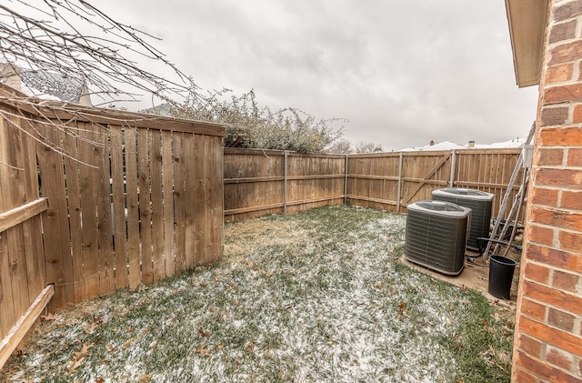 view of yard featuring central AC