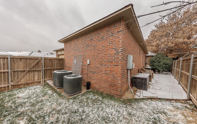 view of home's exterior featuring a patio and central air condition unit