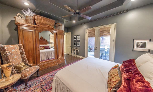 bedroom with dark hardwood / wood-style floors, access to exterior, ceiling fan, and french doors