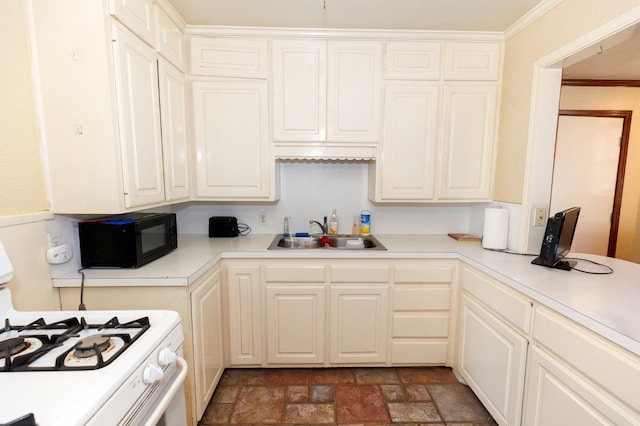 kitchen with ornamental molding, white gas range, and sink