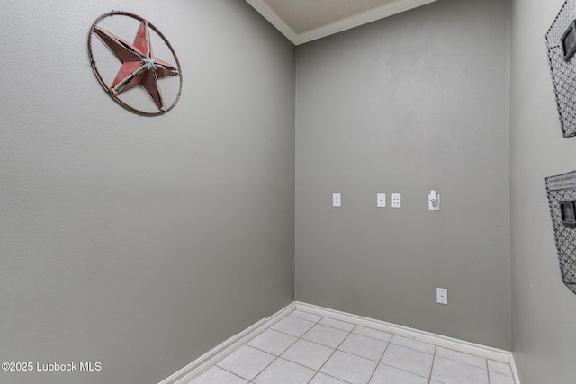 5516 101st Pl, Lubbock, TX 79424 - spare room featuring ornamental molding, baseboards, and light tile patterned floors