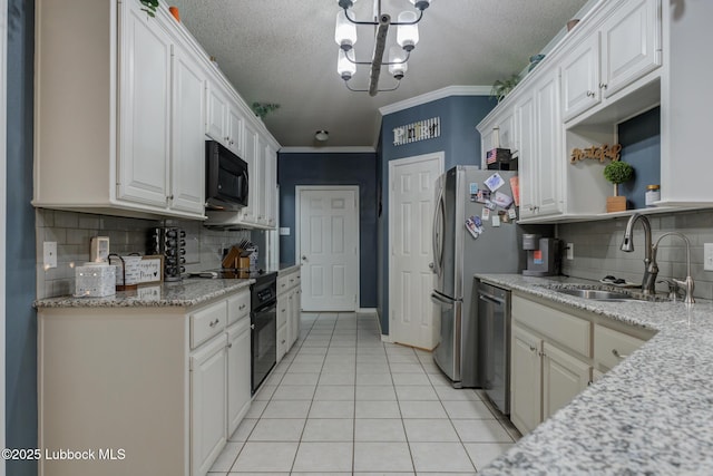 5516 101st Pl, Lubbock, TX 79424 - kitchen featuring a sink, black appliances, light tile patterned floors, tasteful backsplash, and open shelves