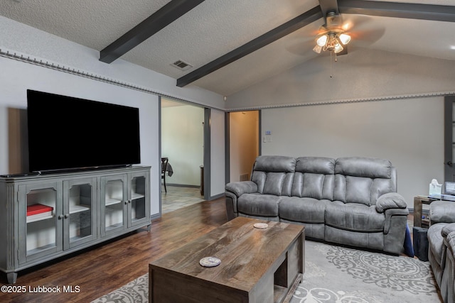 2608 74th Pl, Lubbock, TX 79423 - living room featuring ceiling fan, wood finished floors, and a textured ceiling