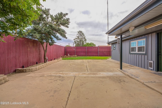 2608 74th Pl, Lubbock, TX 79423 - fenced backyard with a patio