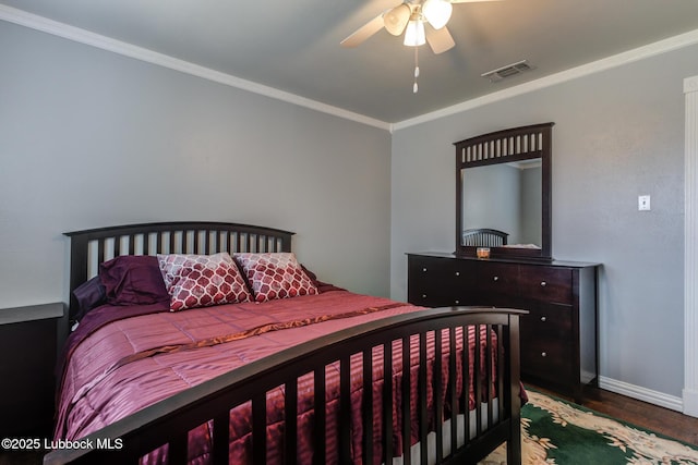 2608 74th Pl, Lubbock, TX 79423 - bedroom with wood finished floors, ornamental molding, and ceiling fan
