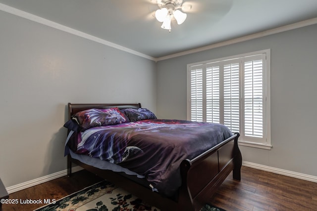 2608 74th Pl, Lubbock, TX 79423 - bedroom with wood finished floors, ornamental molding, and ceiling fan