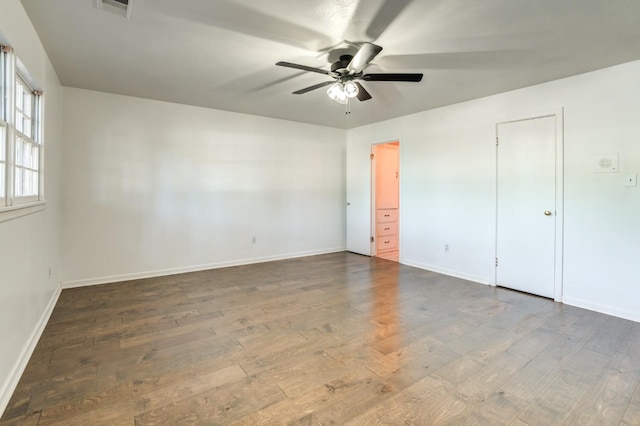 unfurnished bedroom featuring hardwood / wood-style flooring and ceiling fan