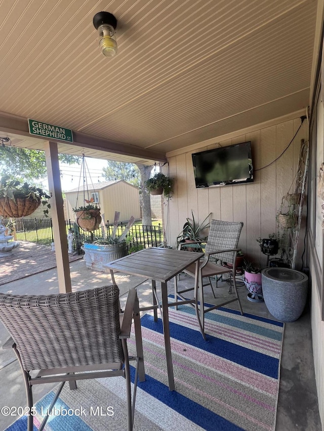 view of patio with fence