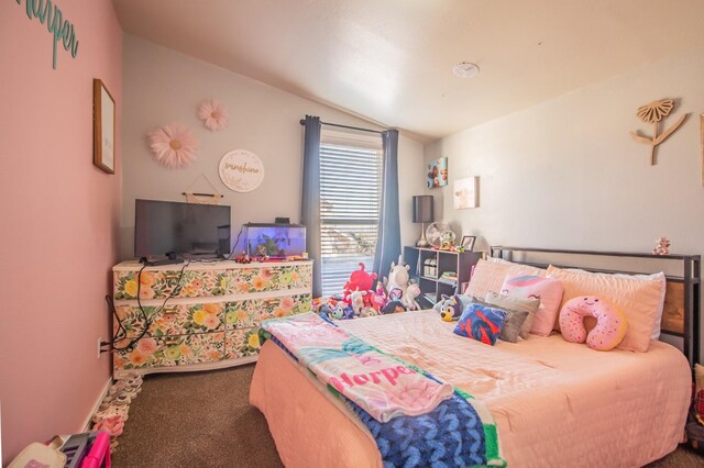 carpeted bedroom featuring vaulted ceiling